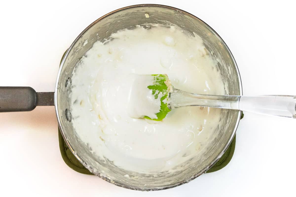 Melt the butter and marshmallows together.
