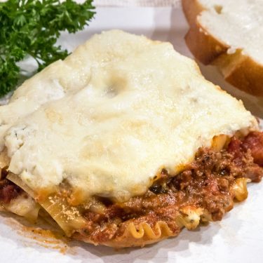Ricotta cheese lasagna recipe close up on a plate.