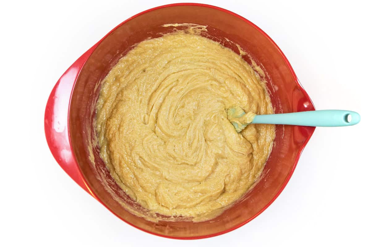 Mix the eggs, melted butter, granulated sugar, brown sugar, and vanilla extract until blended into a creamy cookie dough.