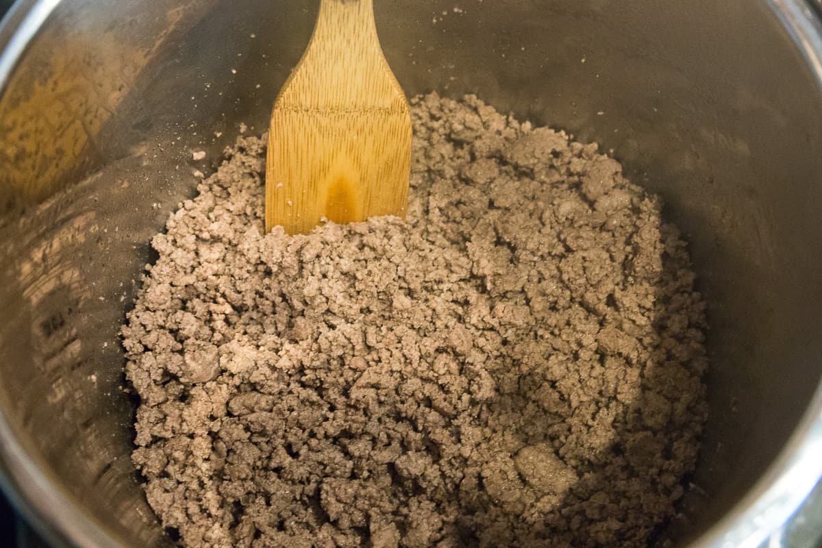 Browned lean ground beef with no pink showing.