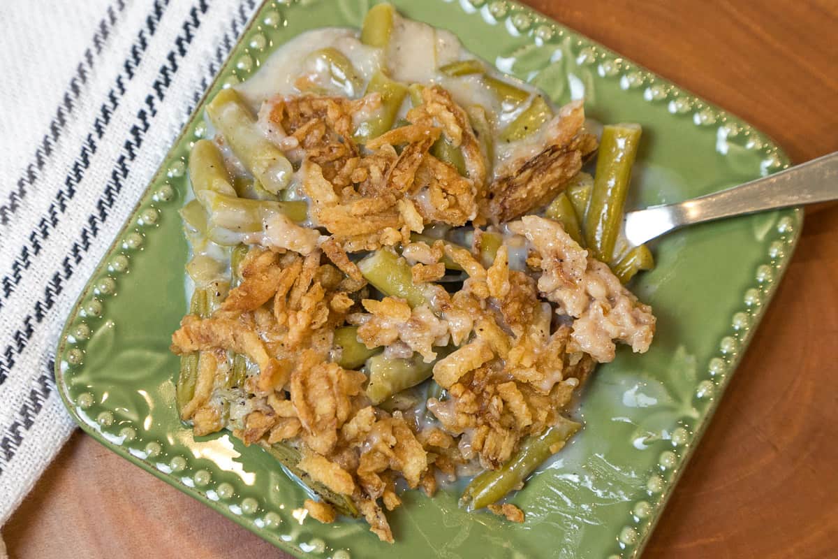 Spicy green bean casserole in a loaf pan.