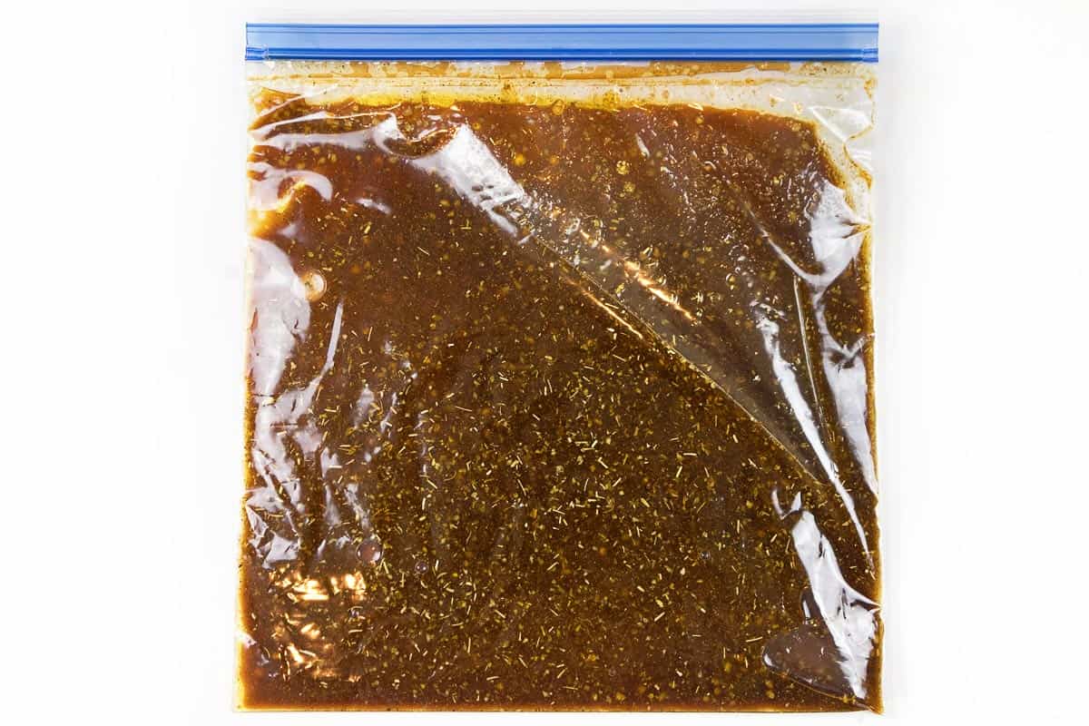 Marinated seasoning sauce in a zip lock bag.