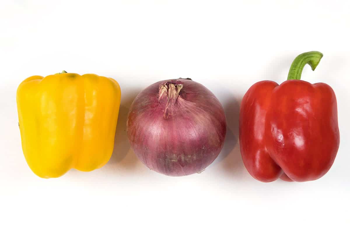 One yellow pepper, one red onion, and one red pepper.