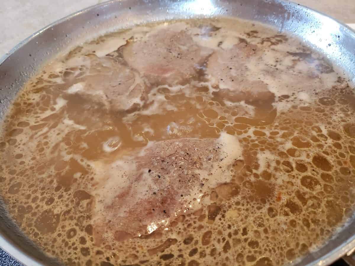 Keep the frying pan filled with water and simmer the steaks for three and a half to four hours