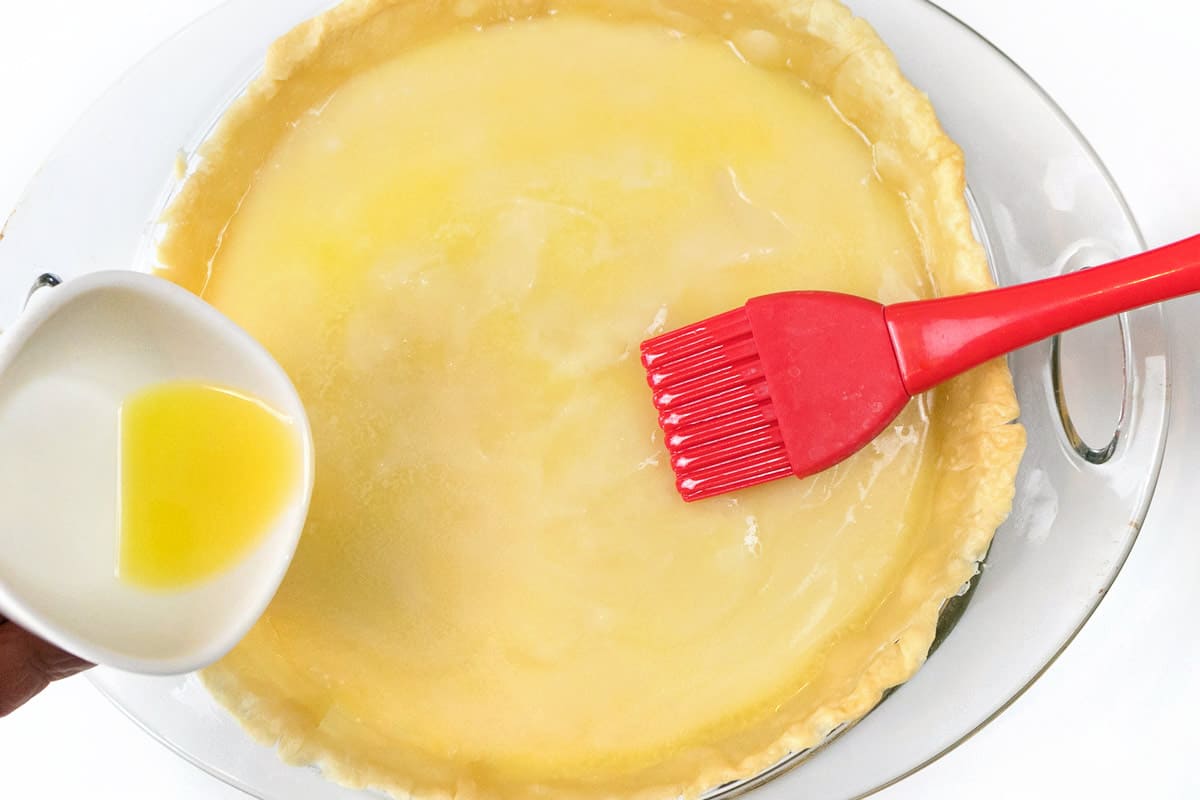 Melted butter brushed on the thickened cream mixture.