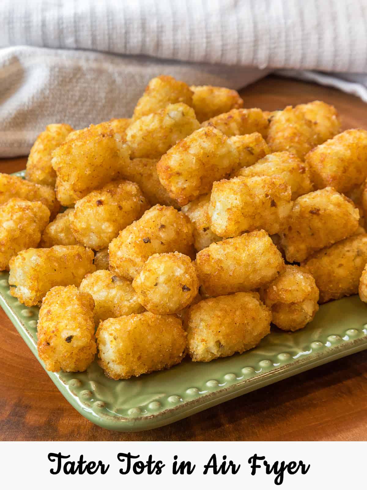 Close-up photo of tater tots on a plate.