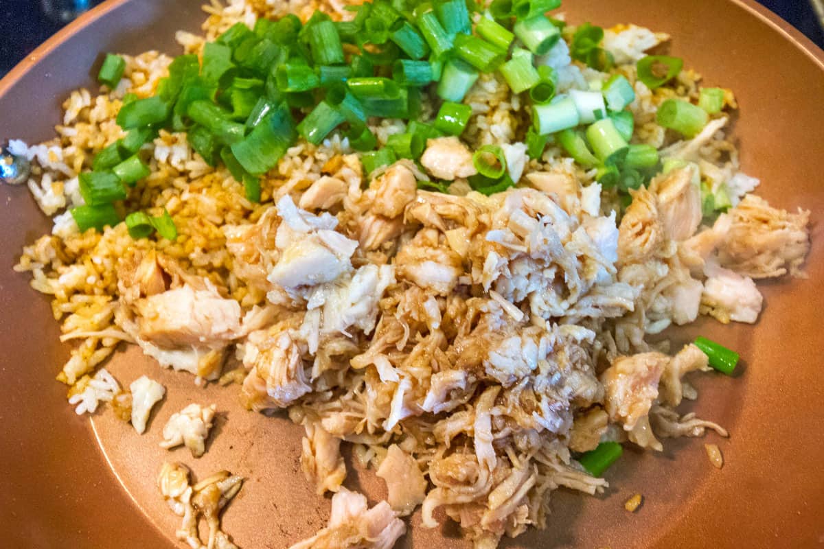 Add the chicken and onions to the frying pan and stir together.