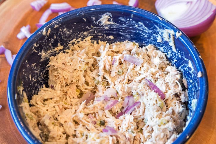 Tuna salad mixture in a bowl.