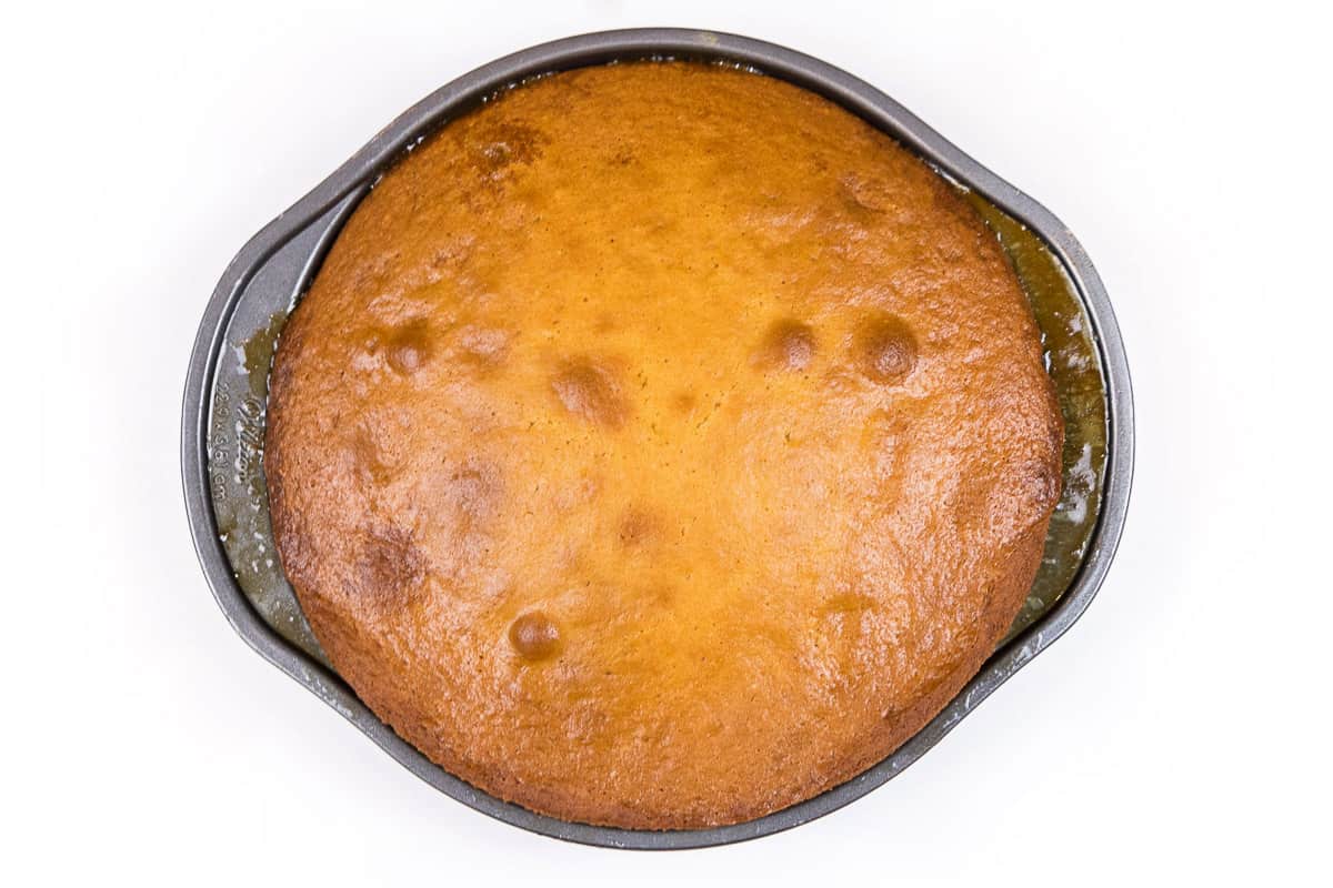 Bake the white nectarine cake (upside-down) at three hundred and fifty degrees Fahrenheit for forty minutes.